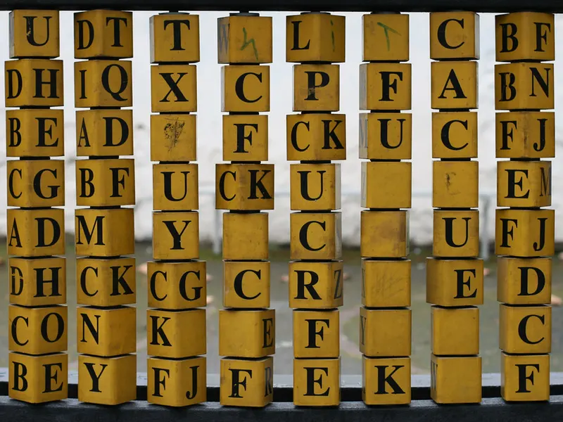 Rows of wooden letter tiles