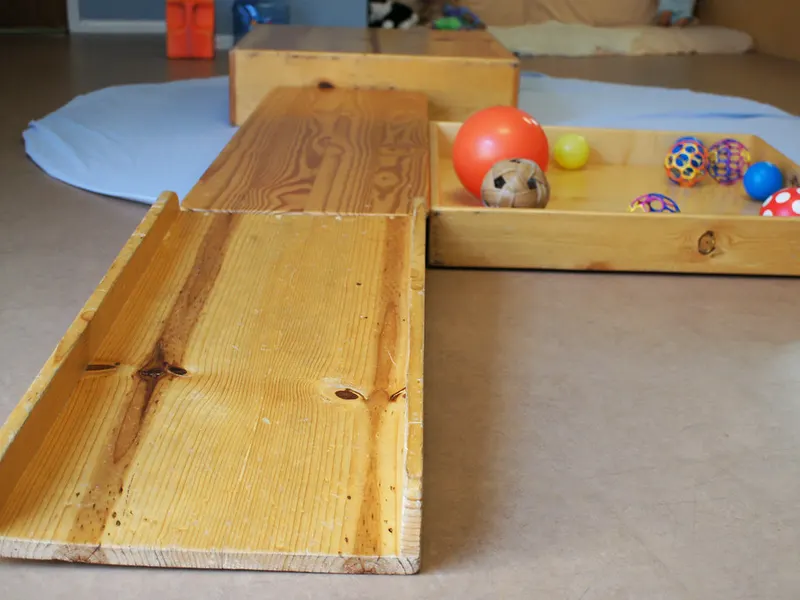 Wooden play ramps and boxes for early walkers