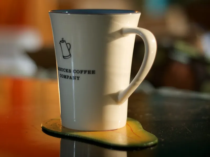 Mug of coffee in quiet morning light