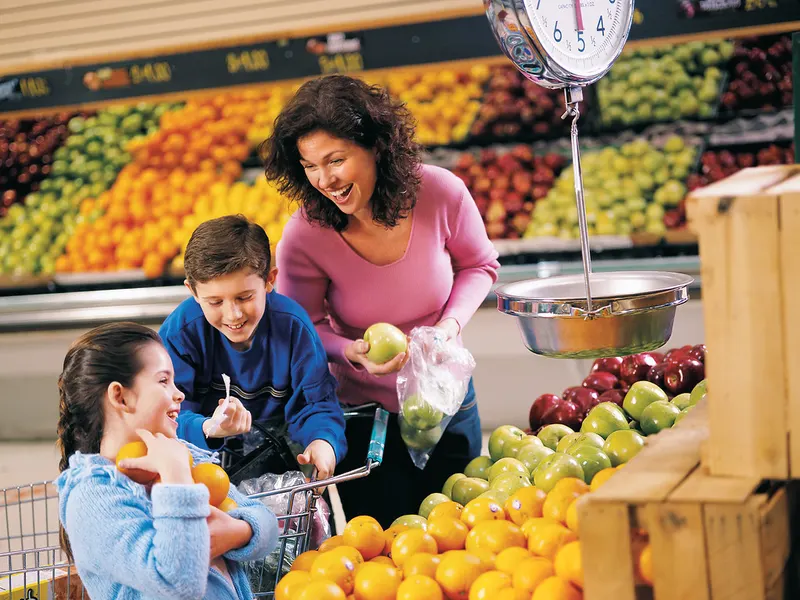Family choosing fresh fruit together